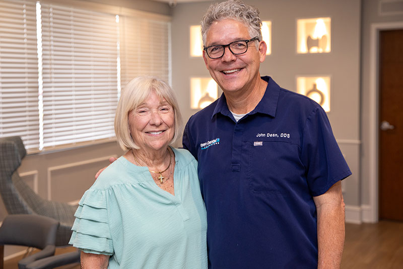 Paitent and doctor smiling